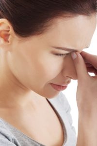 Woman in Pain Retinitis Pigmentosa causes treatment eye center new jersey